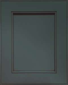 Dark green cabinet door with decorative molding.